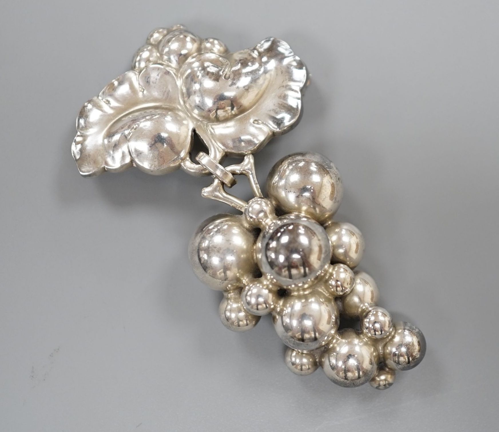 A Georg Jensen 'bunch of grapes' drop brooch, no.217B, 65mm.